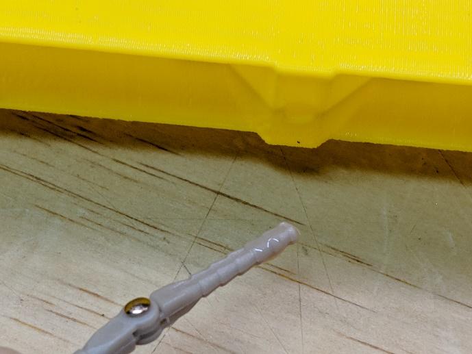 Hinge pins pushed into the wing mount holes