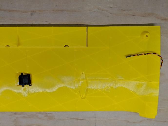 Aileron servo leads threaded through the wing tubes