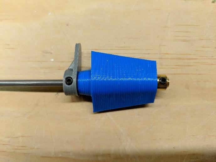 Shaft secured with shaft collars