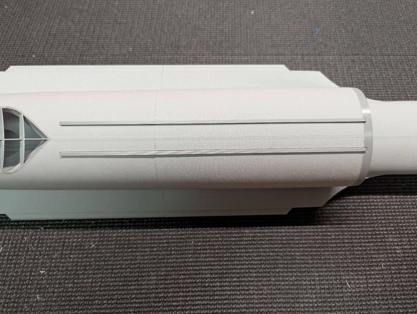 Belly rails, forward edges angled backwards