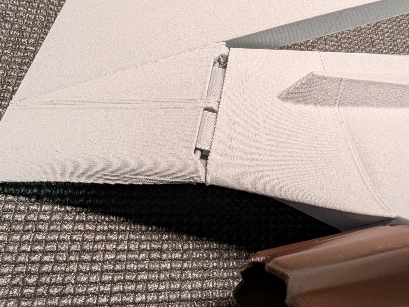 Filament hinge trimmed to length