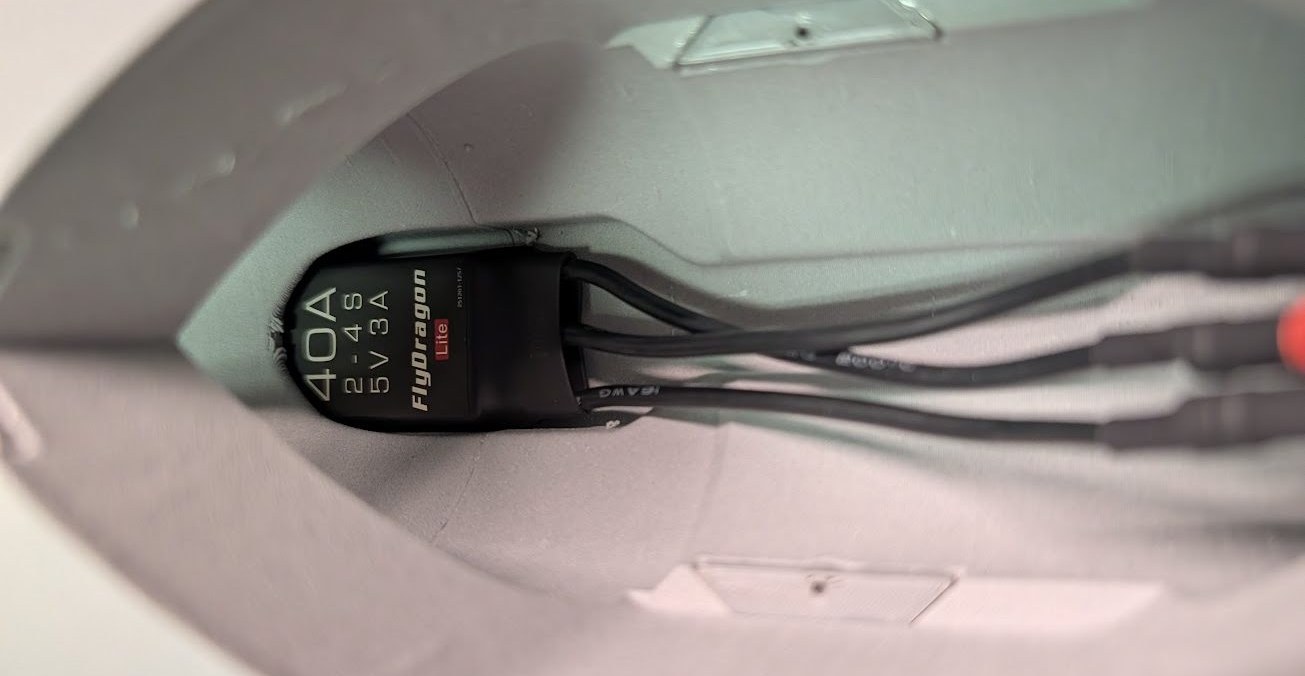 ESC and wiring fed into the fuselage channel