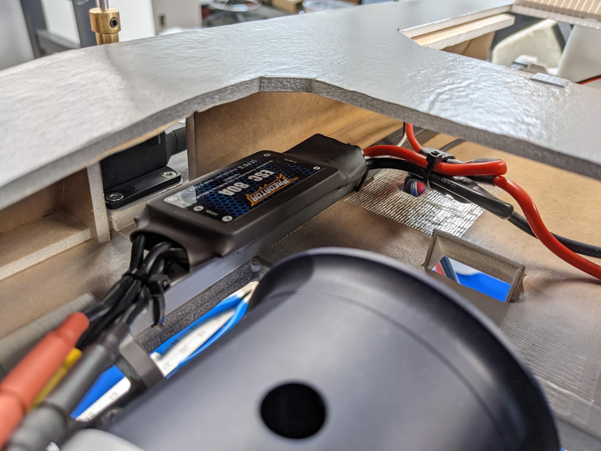 Battery connector passed through