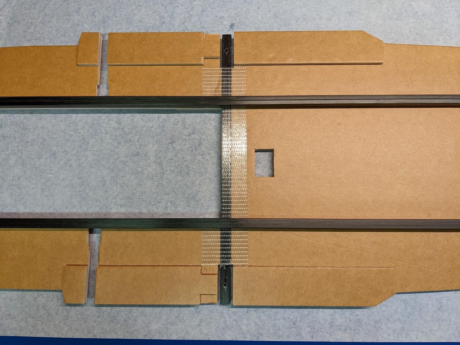 Lower fuselage doublers laminated