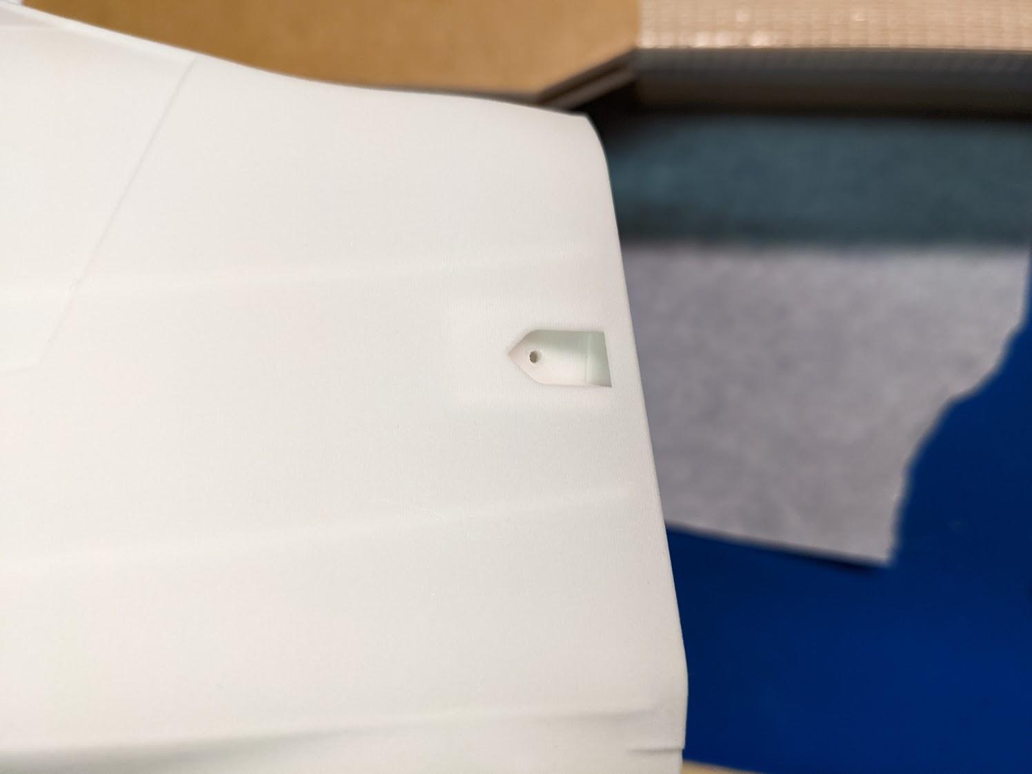 Upper nose screw clearance holes
