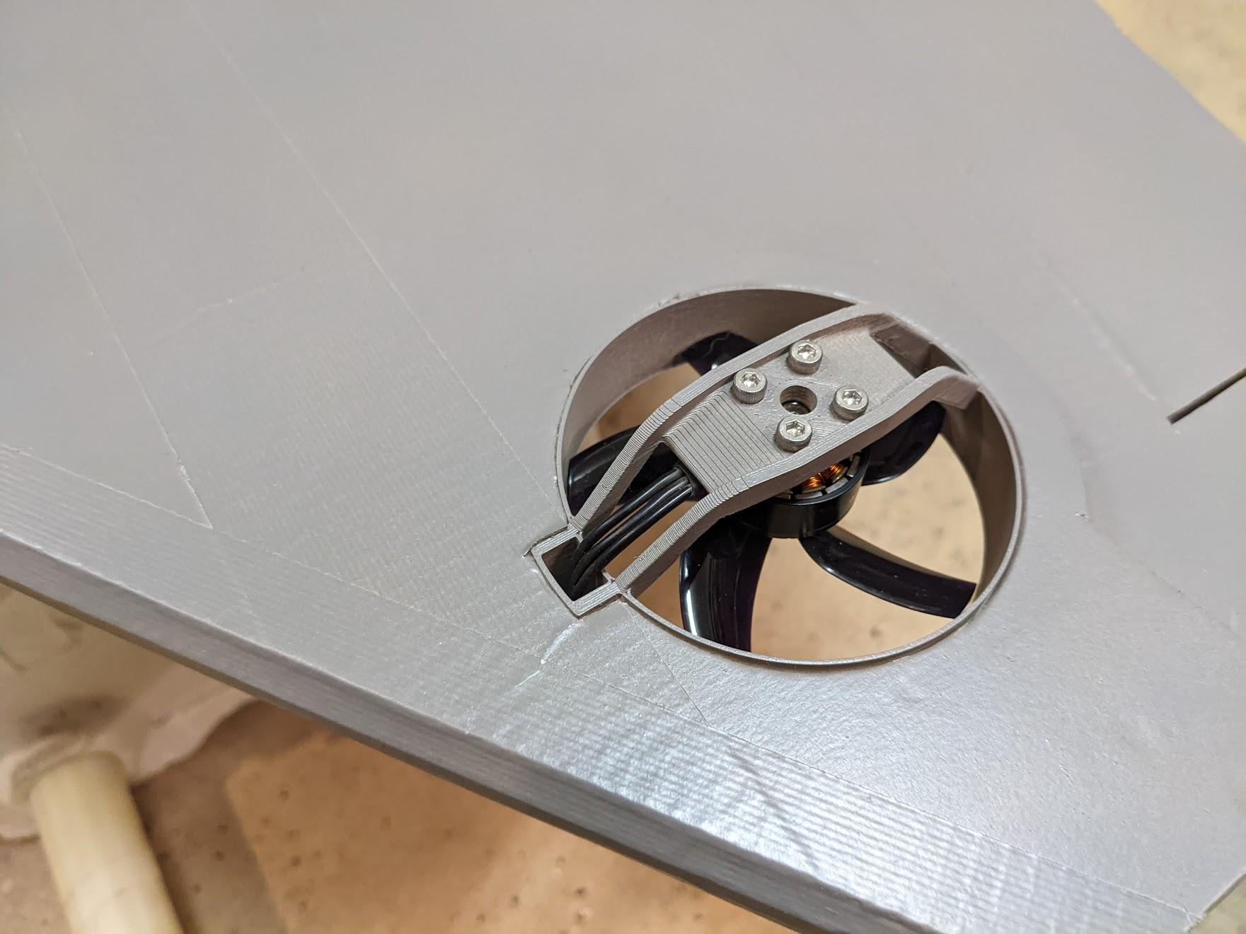 Roll motors mounted in the housings