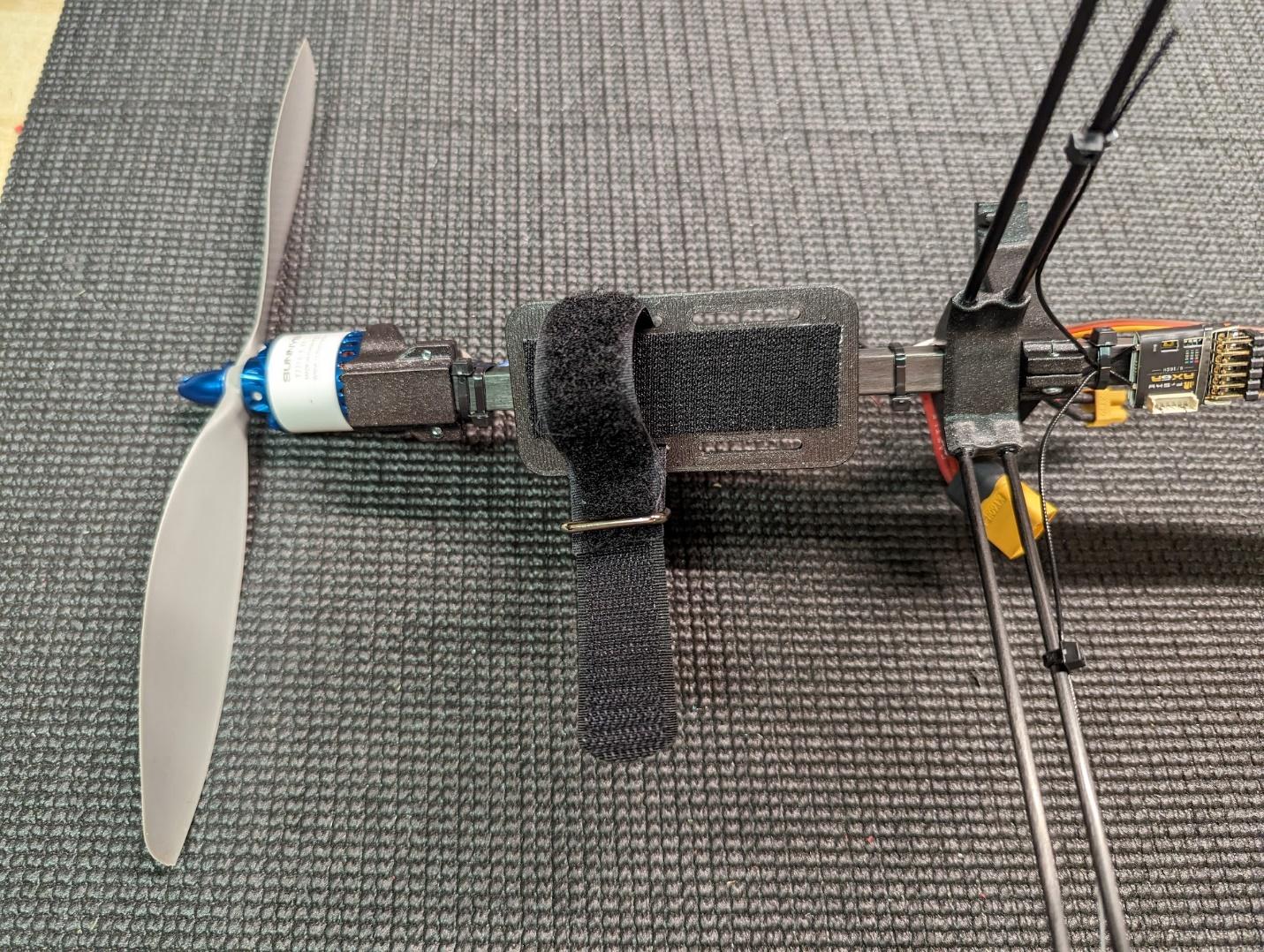 Battery secured to the battery tray