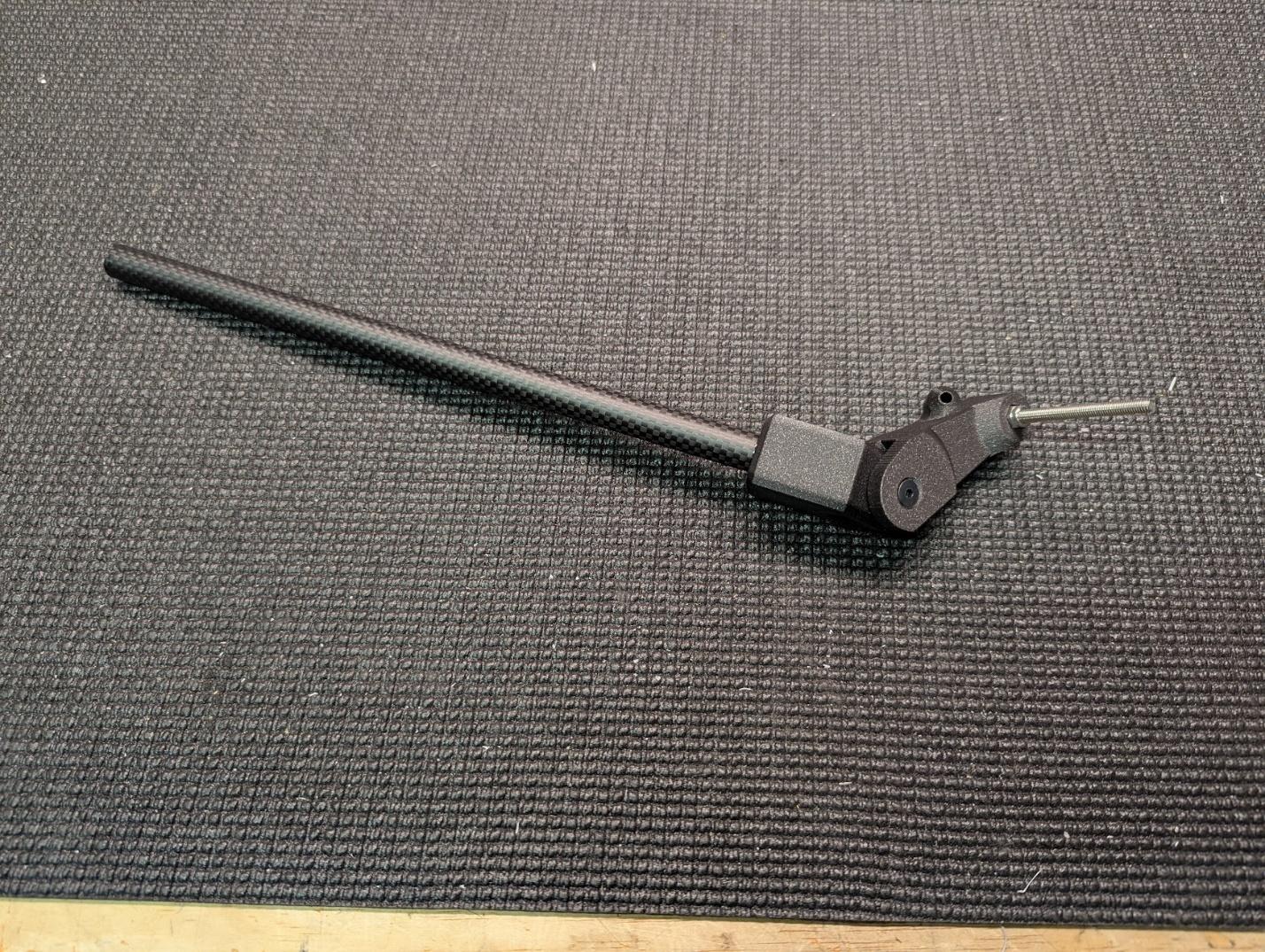 Main gear arm pivot