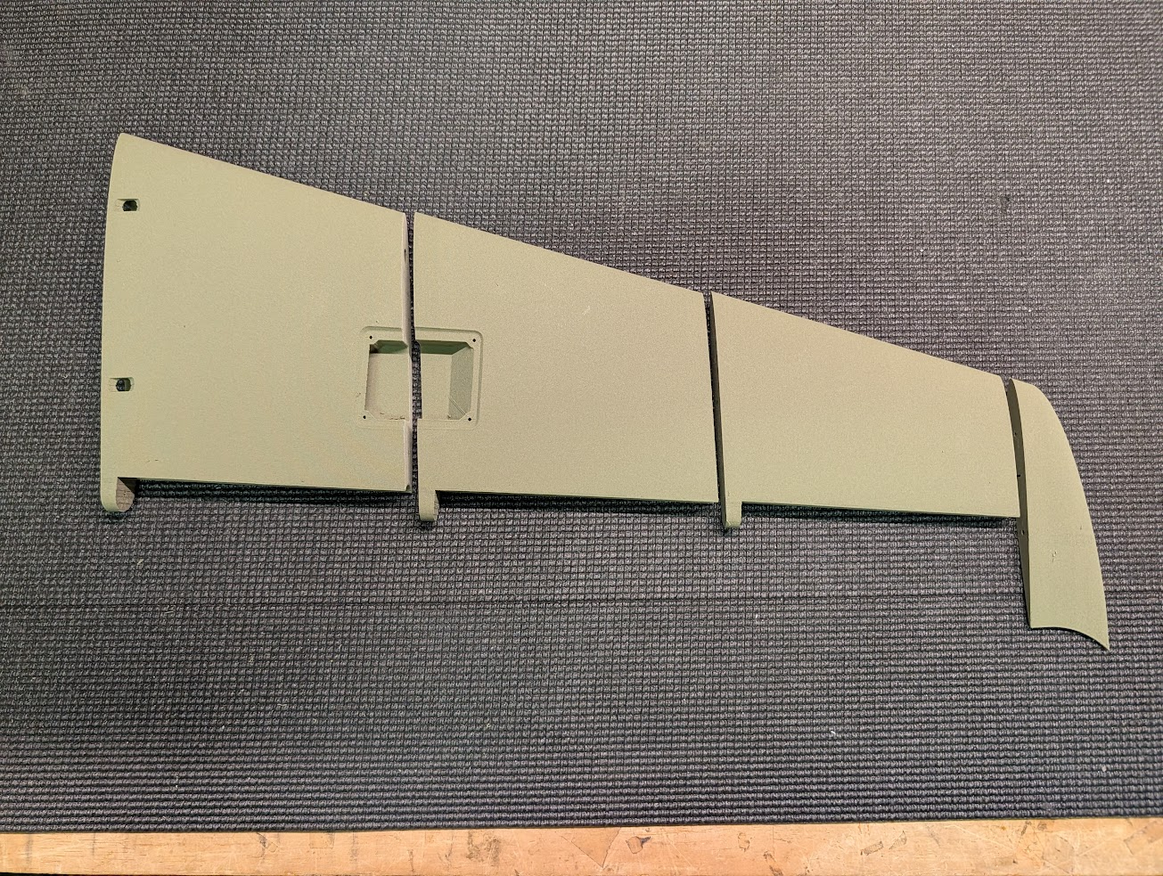 Tail surface sections joined