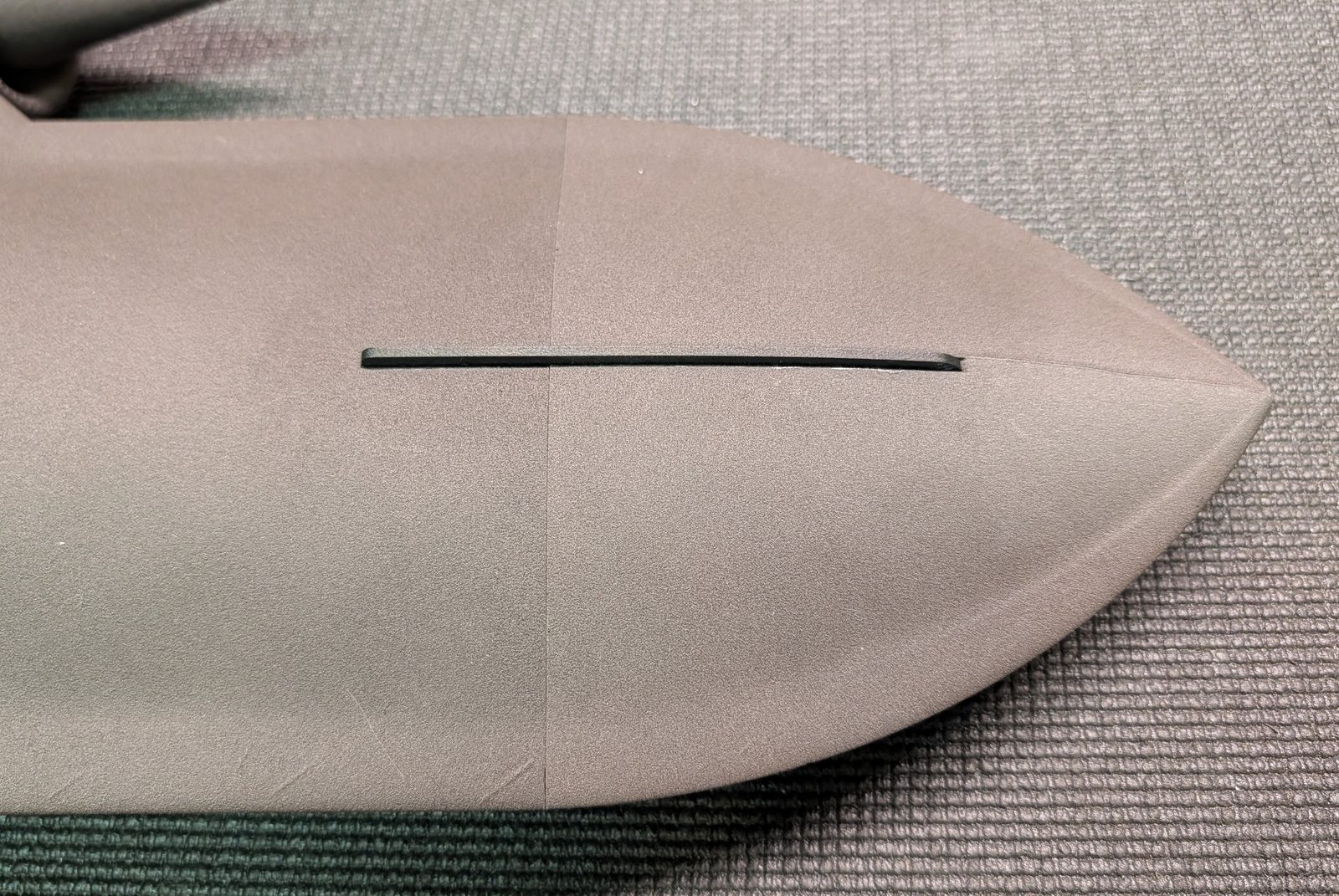 The nose skid glued into its slot on the belly