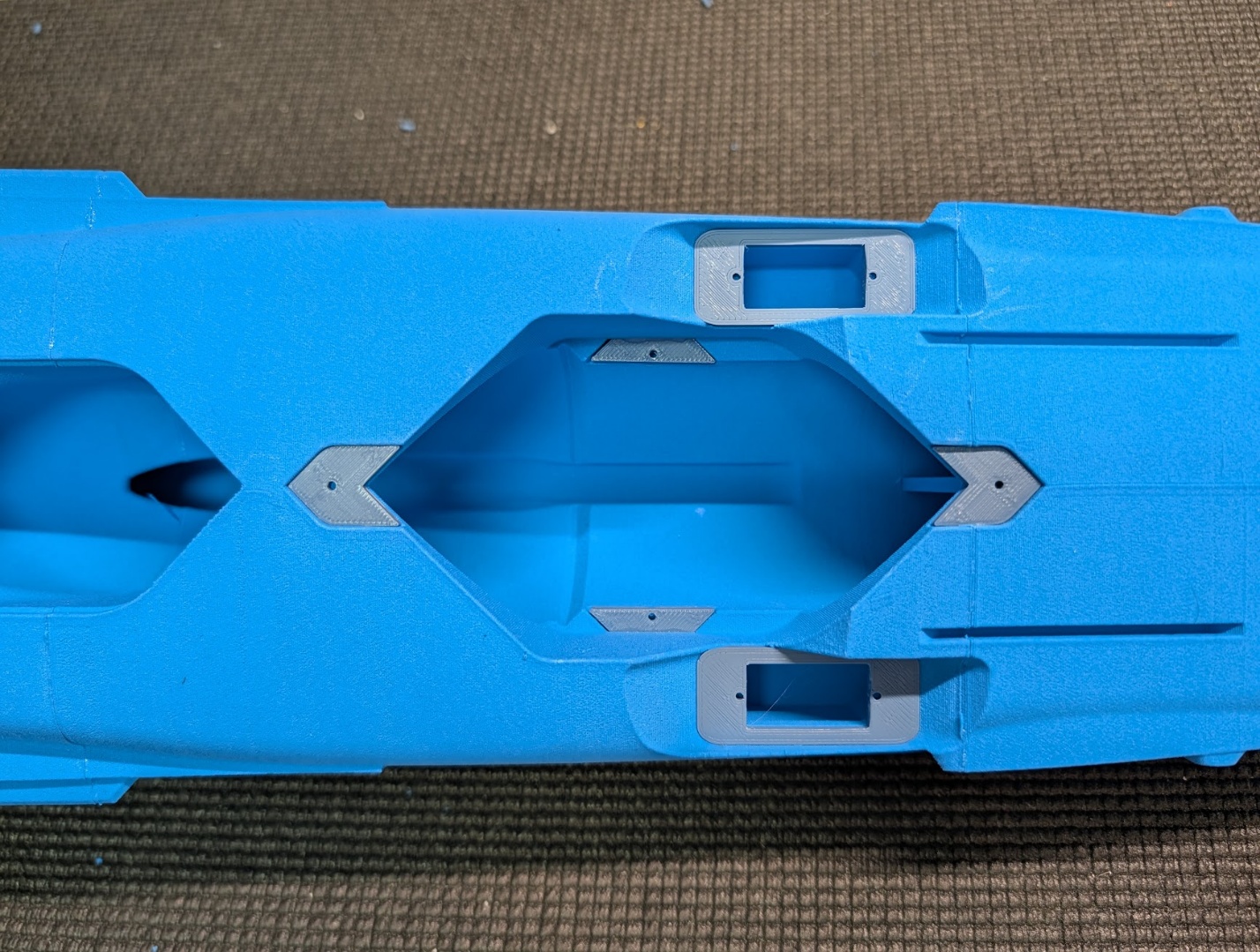 Fan mount tabs and servo plates glued in