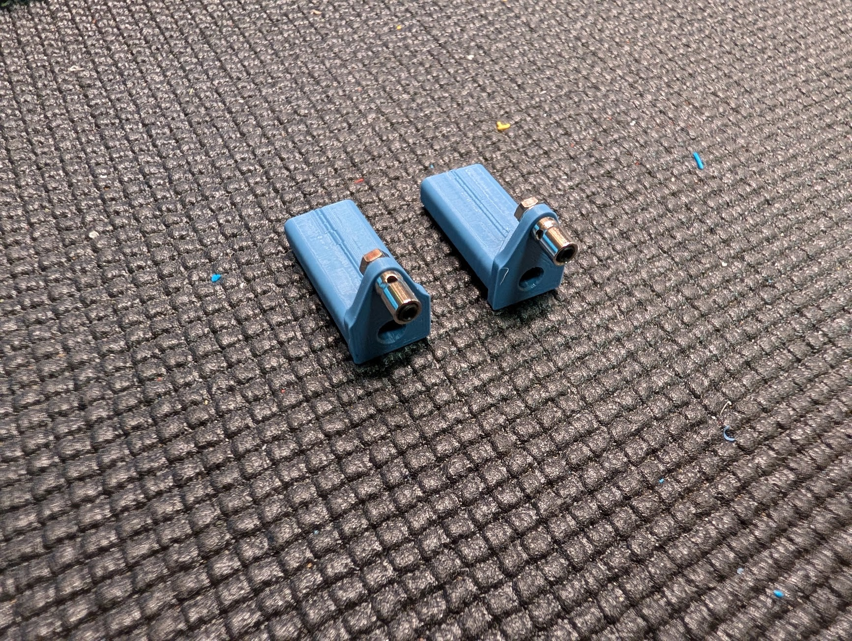 Pivot blocks with pushrod connectors