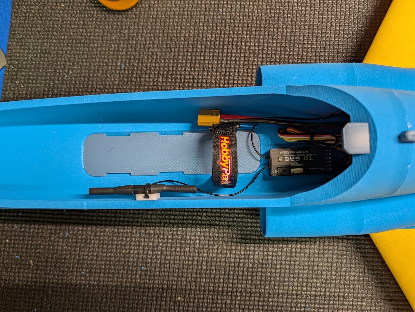 Battery tray glued into the cabin