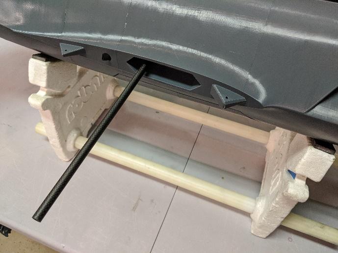 Carbon fiber wing tube inserted into the fuselage