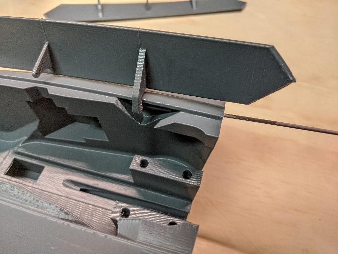 Sliding the hinge rods into their channels
