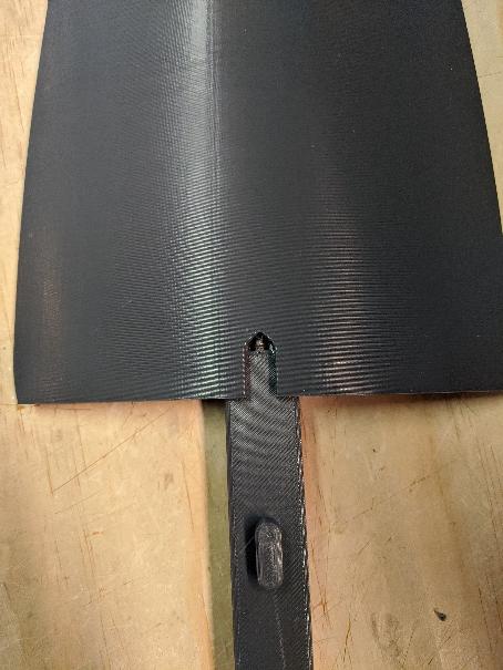 Pen spring and hatch latch inserted