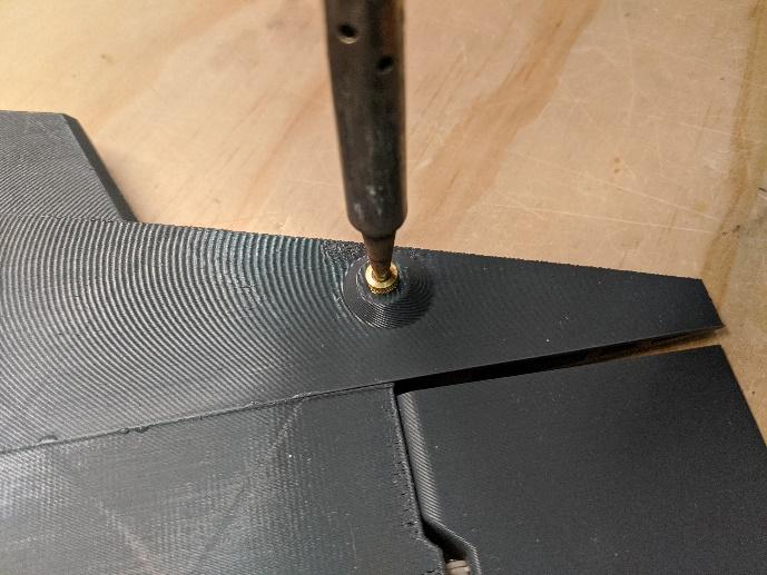 Installing a threaded insert in the stabilizer