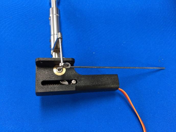 Z-bend pushrod inserted into the steering arm